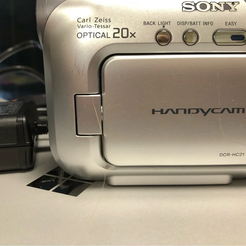 Sony Silver Handycam with Black Adapter